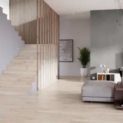 Jasne, drewniane schody w mieszkaniu dwupoziomowym, z nowoczesną balustradą i dyskretnym oświetleniem.